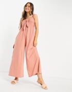 Asos Design Tie Front Swing Jumpsuit In Apricot-pink