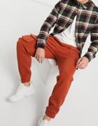 Asos Design Tapered Sweatpants With Multi Utility Pockets & Tab Cuffs In Burnt Red-brown