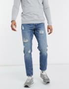 Asos Design Tapered Jeans In Vintage Mid Wash Blue With Heavy Rips