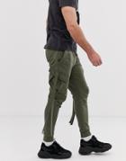 Asos Design Skinny Sweatpants With Cargo Pockets And Strapping In Khaki-green