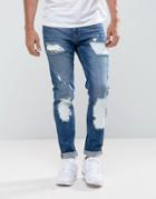 Asos Skinny Jeans In Mid Wash Blue With Rip And Repair - Blue