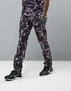 Ellesse Joggers With Reflective Logo In Camo Print - Black