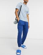Asos Design Oversized Sweatpants In Washed Dark Blue-blues
