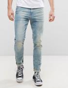 Asos Design Skinny Jeans In 12.5oz Bleach Wash Blue