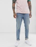 Asos Design Tapered Jeans In Light Wash Blue