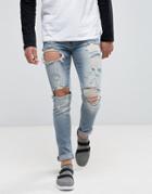 Asos Skinny Jeans In Vintage Light Wash Blue With Heavy Rips - Blue