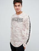 Hollister Long Sleeve Top Athleisure Logo Sleeve Print In Cream Camo - White
