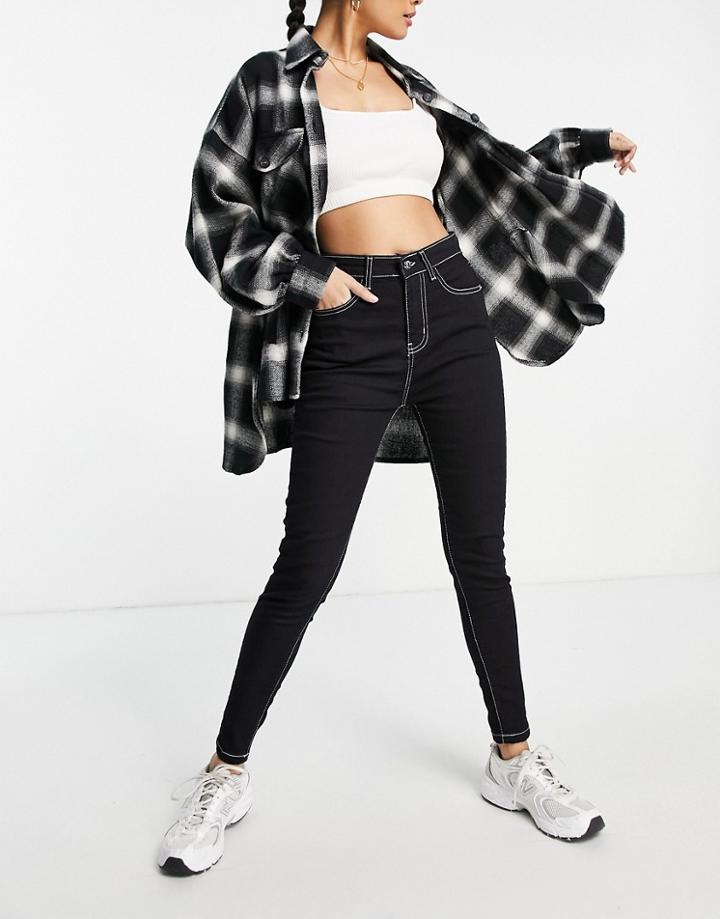 Rebellious Fashion Contrast Stitch Skinny Jeans In Black And White