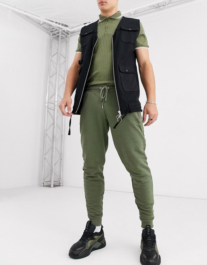 Asos Design Tapered Sweatpants In Khaki With Silver Zip Pockets-green