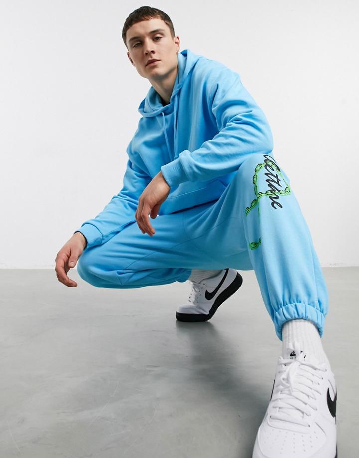 Asos Design Matching Oversized Sweatpants With Text Print-blues