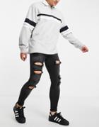 Asos Design Spray On Jeans With Power Stretch In Washed Black With Heavy Rips