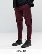 Asos Tapered Joggers With Cargo Pockets In Burgundy - Oxblood