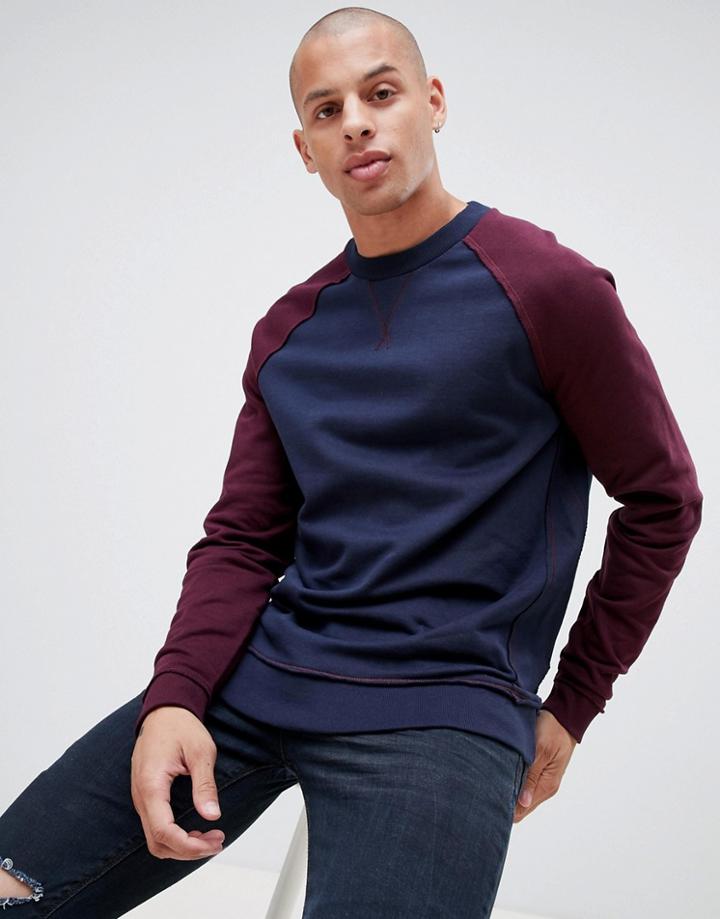Asos Design Sweatshirt With Contrast Raglan Sleeves And Raw Edge Seam Detail-navy