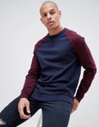 Asos Design Sweatshirt With Contrast Raglan Sleeves And Raw Edge Seam Detail-navy