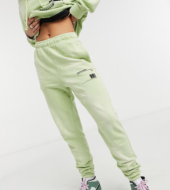 Collusion Text Print Bleached Wash Skinny Sweatpants In Green