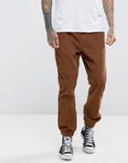 Asos Tapered Cord Joggers In Rust - Brown