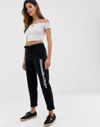 Abercrombie & Fitch Cuffed Sweatpants With Leg Logo - Black