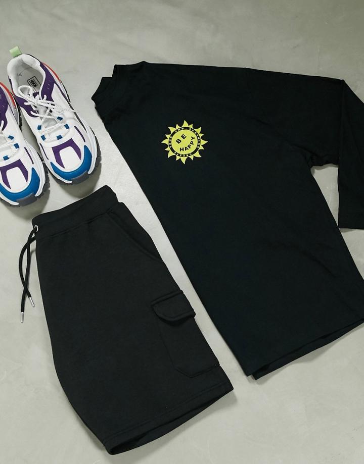 Asos Design Long Sleeve Oversized T-shirt With Sun Chest Print In Black