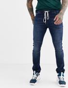 Asos Design Super Skinny Jogger Jeans With Biker Details In Dark Wash Blue