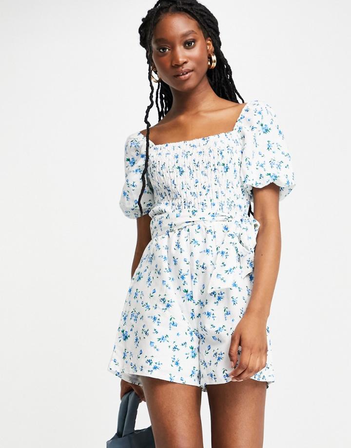 Lipsy Shirred Short Sleeve Belted Romper In Blue Floral Print-multi