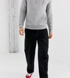 Crooked Tongues Cropped Tapered Jeans In Black - Black