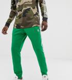 Adidas Originals 3 -stripe Skinny Joggers With Cuffed Hem In Green - Green