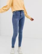 Weekday High Waisted Skinny Jeans In Mid Blue - Blue