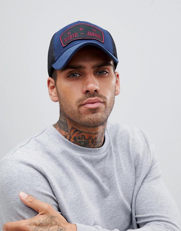 Asos Design Trucker Cap In Navy Faux Suede With Badge Detailing - Blue