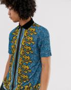 Asos Design Relaxed Longline Polo In Blue Leopard Print With Baroque Border Print