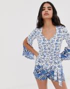 Parisian Long Sleeve Romper In Floral Border Print-blue