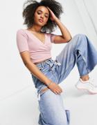 Asos Design Short Sleeve Wrap Front Crop Top In Pink