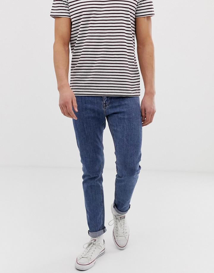 Asos Design Skinny Jeans In Flat Mid Blue - Blue