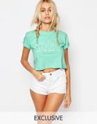 Kiss & Tell Cropped Tee With Rolled Sleeves And Mint Glitter Print - Blue