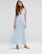 Goldie Riveria Ditsy Printed Maxi Dress With Low Neckline And Cross Straps At The Back - Multi