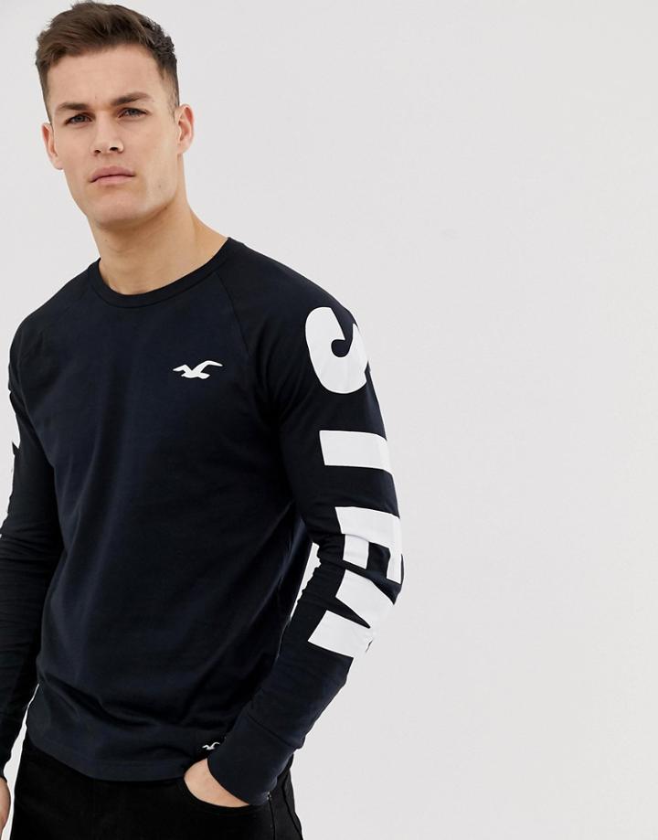 Hollister Relaxed Fit Sleeve Logo Long Sleeve Top In Black/white - Black
