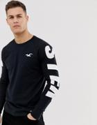 Hollister Relaxed Fit Sleeve Logo Long Sleeve Top In Black/white - Black