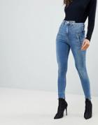 Asos Ridley High Waist Skinny Jeans With Deconstructed Styling In Bennu Vintage Mid Wash-blue