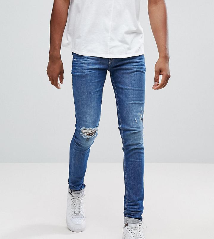 Asos Tall Super Skinny Jeans In Mid Wash Blue With Rip And Repair - Blue