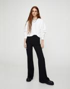 Pull & Bear Ribbed Flare Pants In Black