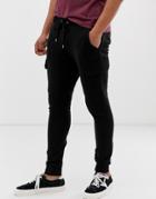 Asos Design Super Skinny Sweatpants With Cargo Pockets In Black - Black