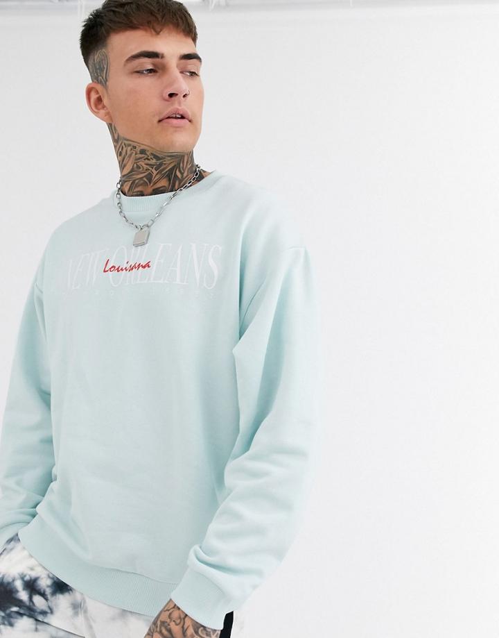 Asos Design Oversized Sweatshirt With New Orleans Print In Blue