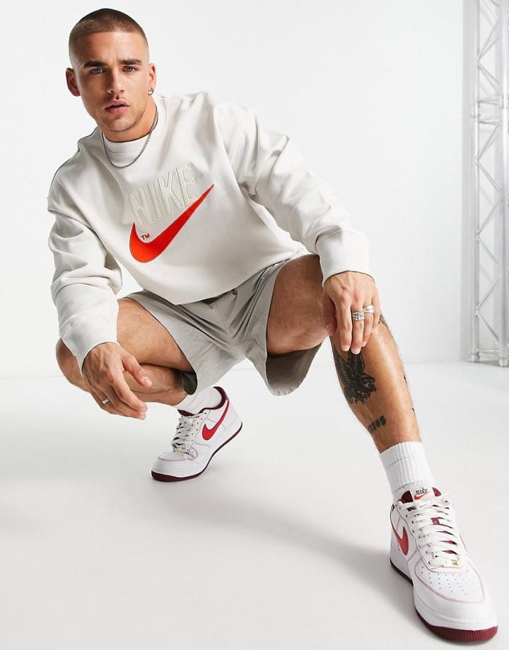 Nike Trend Fleece Retro Logo Crew Neck Sweatshirt In Stone-neutral