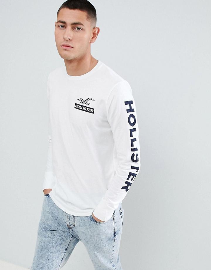 Hollister Checkerboard Back Print Logo And Sleeve Logo Long Sleeve Top In White - White