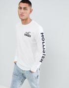 Hollister Checkerboard Back Print Logo And Sleeve Logo Long Sleeve Top In White - White