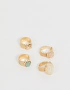 Asos Design Pack Of 4 Rings With Pyramid Stud And Stone Details In Gold Tone