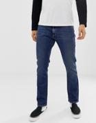 Wrangler Larston Slim Tapered Fit Jeans In Indigo Wit Mid Wash - Blue