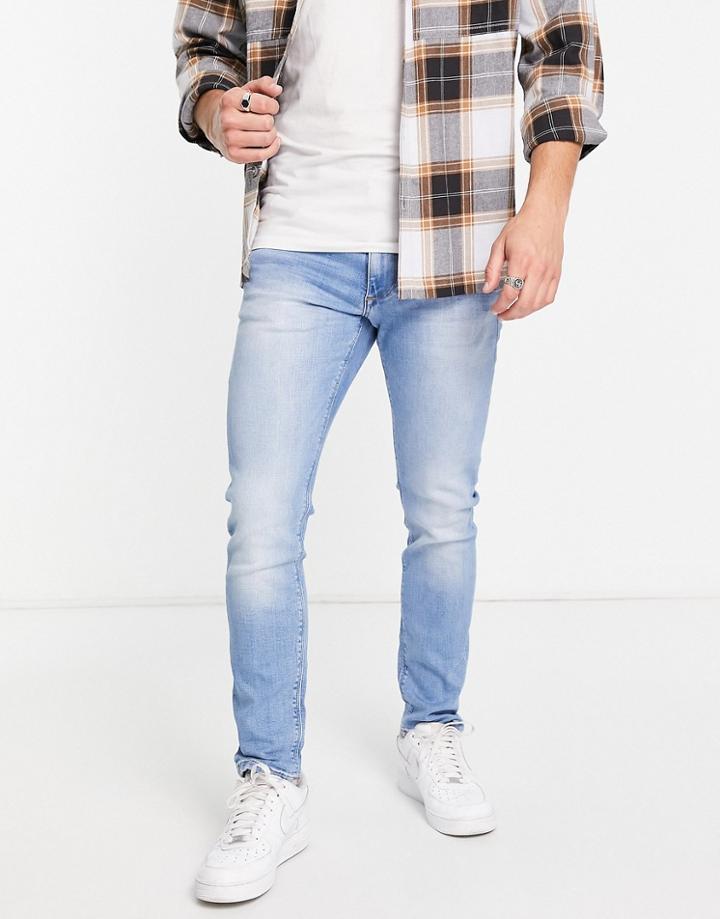 River Island Skinny Jeans In Light Wash Blue