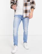 River Island Skinny Jeans In Light Wash Blue