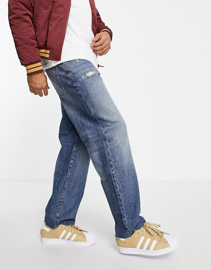 Asos Design Baggy Jeans In Tinted Dark Wash With Abrasions-blues