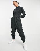 Nike Swoosh Utility Jumpsuit In Black